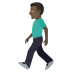 🚶🏿‍♂️ man walking: dark skin tone display on JoyPixels